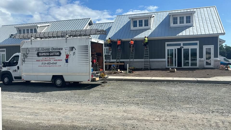 David Allard and the All About Gutters crew on a job site